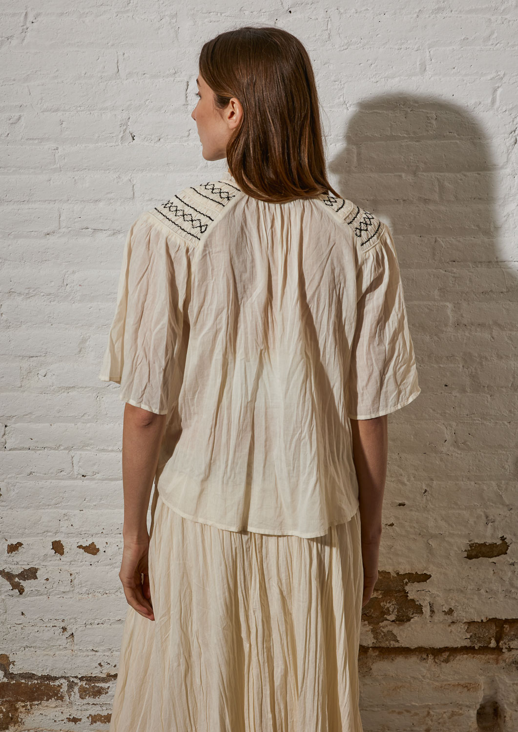 Blusa efecto arrugado.