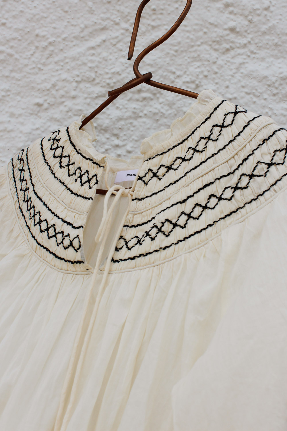 Blusa efecto arrugado.