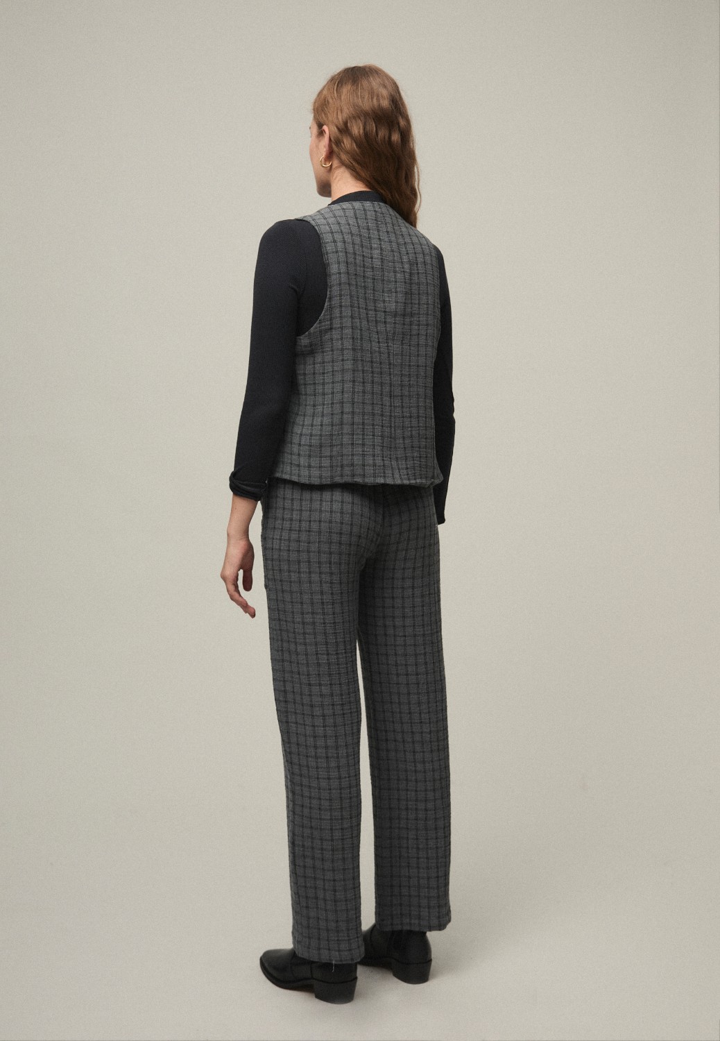 Chaleco cuadros gris Mi&Co.